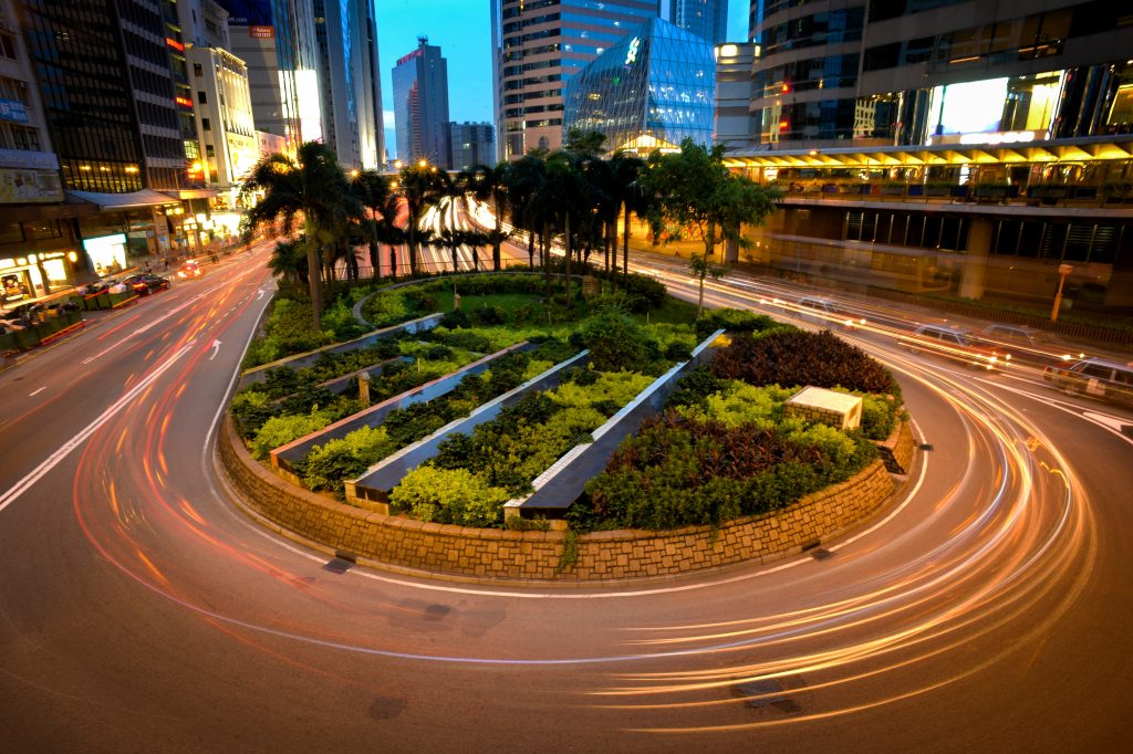 City roundabout with lush greenery