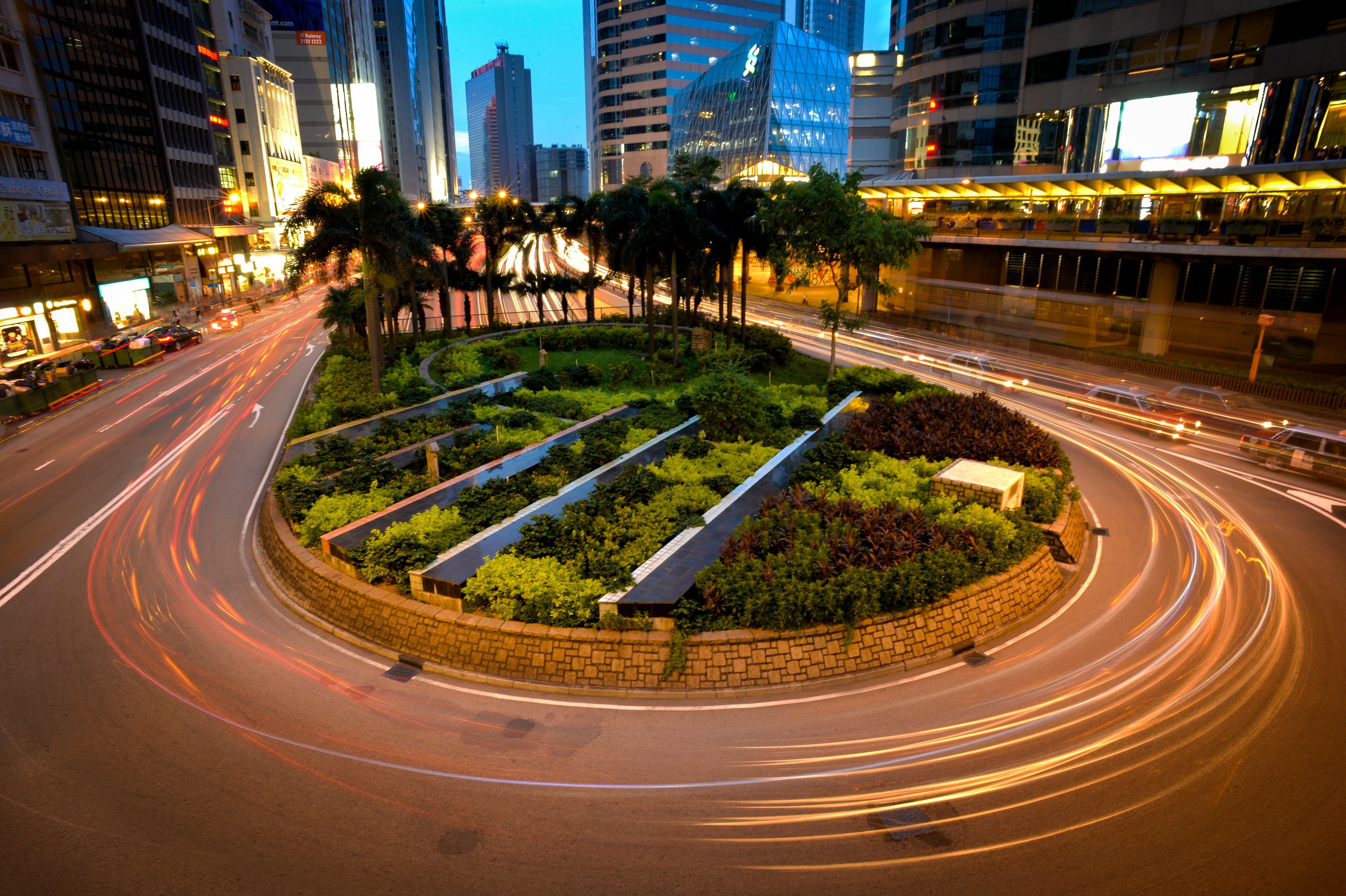 City roundabout with lush greenery